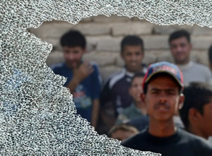 Tempered Glass Breaks into Fragments Leaving Opening Behind Tempered Glass Breaks into Fragments Leaving Opening Behind